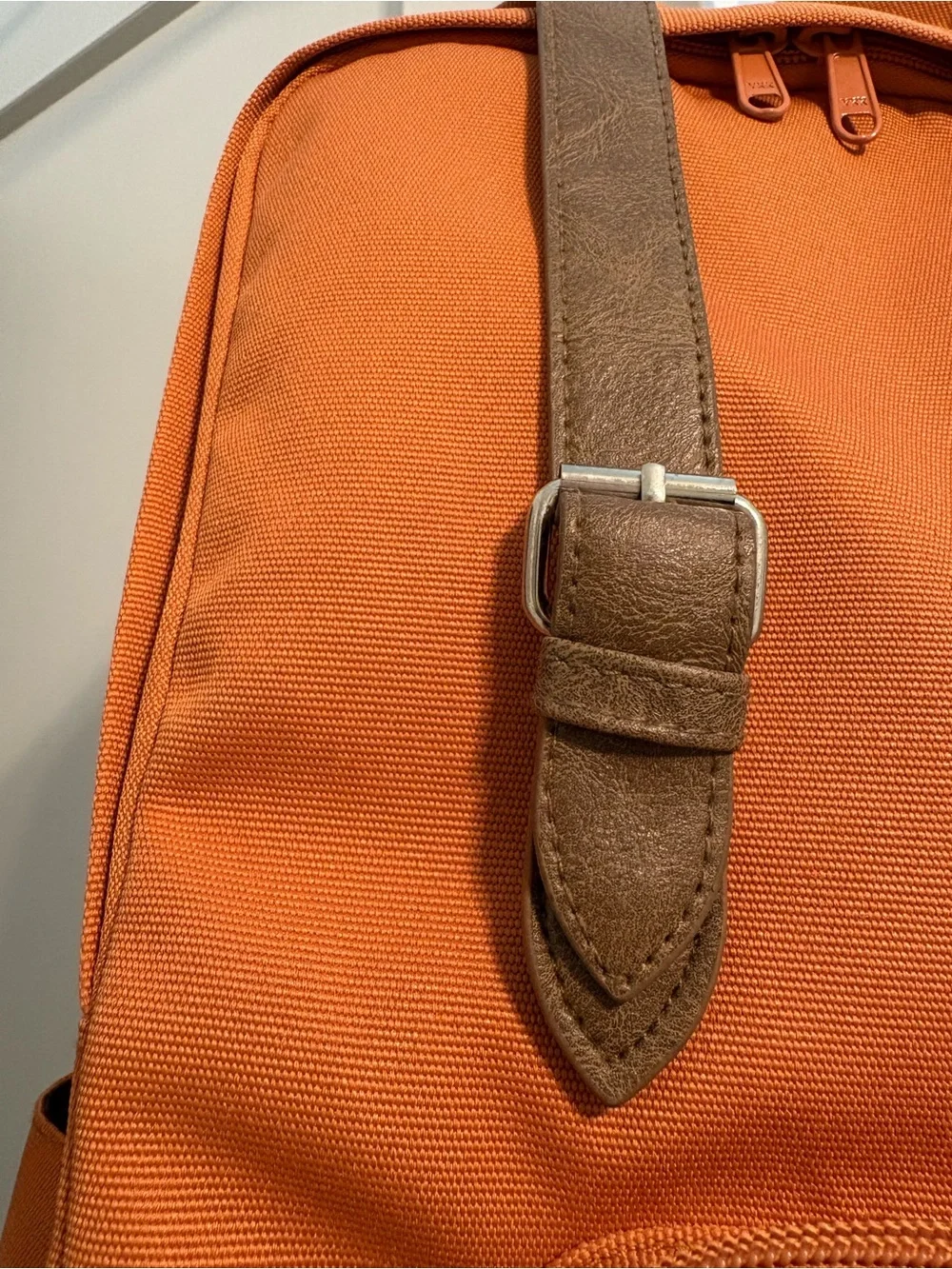 Orange Canvas Backpack with Brown Accents